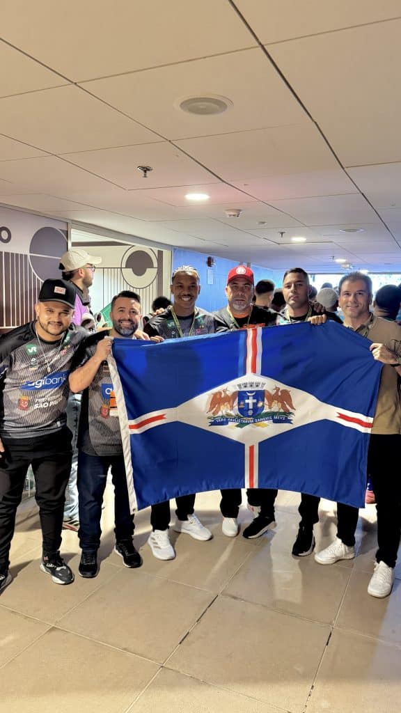 Considerando o tema de esporte, Taça das Favelas, vitória do Estado de São Paulo e o protagonismo de Guarulhos (atletas e comissão técnica), apresento as sugestões para otimizar o texto para SEO: